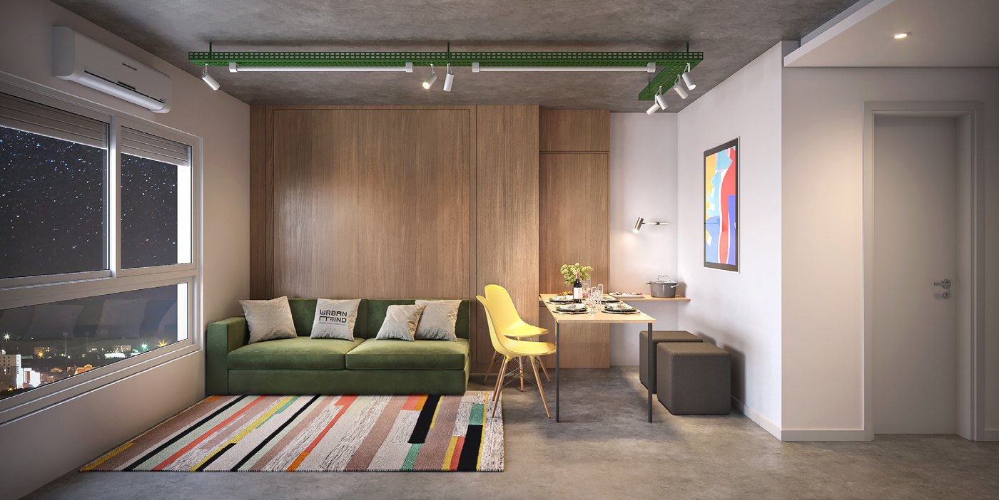 Studio do RISE com a mesa retrátil aberta para quatro pessoas